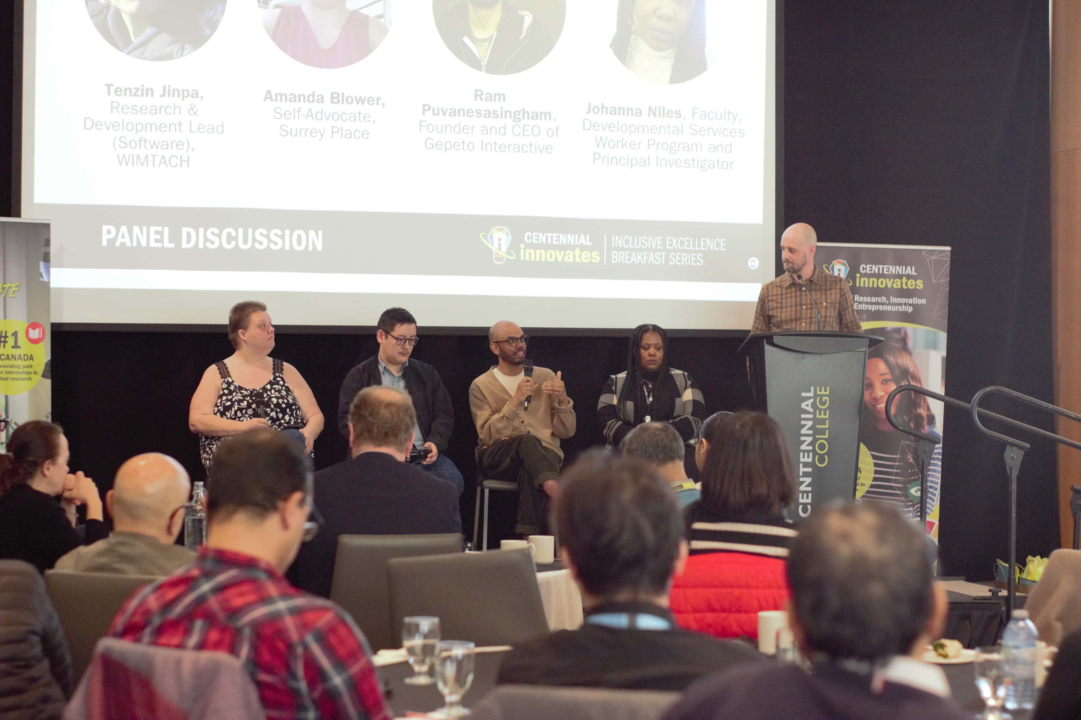 A desk with a variety of electronics on it